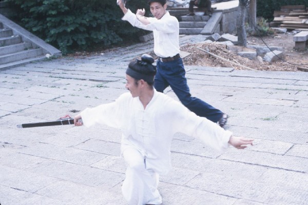 Yang SiLiang and young Taoist practice Taiji 4.jpg 60.9K