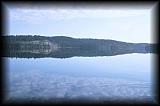 quetico, clouds and calm water.jpg (79709 bytes)